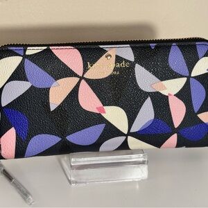 Kate Spade NWT Hawthorne lane spinner long zippy wallet. Tiny nick as shown